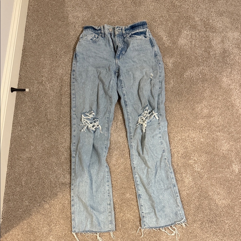 Garage High Rise Ripped Blue Jeans